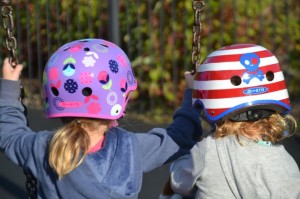 girls in cycle helmets