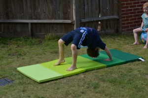 Boy doing bridge