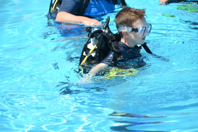 child scuba diving