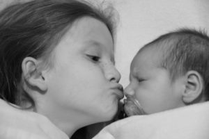 baby and sibling