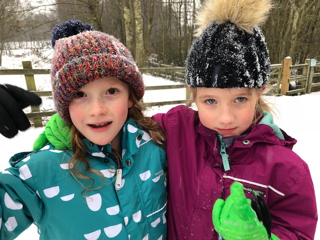 girls in ski jackets
