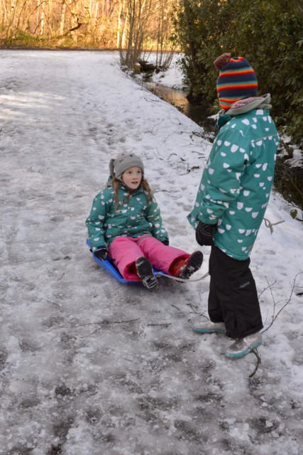 Child pulling a sledge