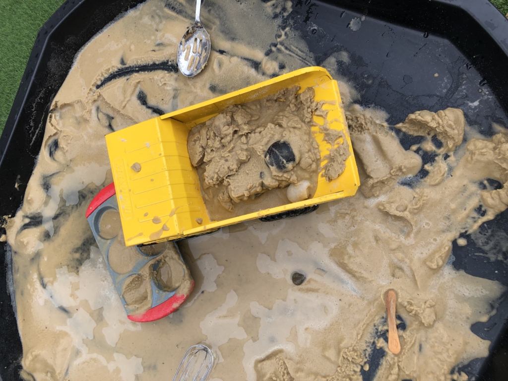 digger and wet sand play tray