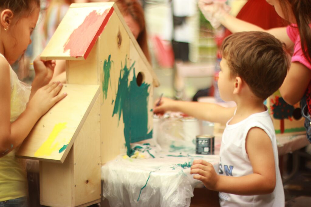 Children painting in nursery