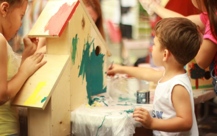 Children painting in nursery