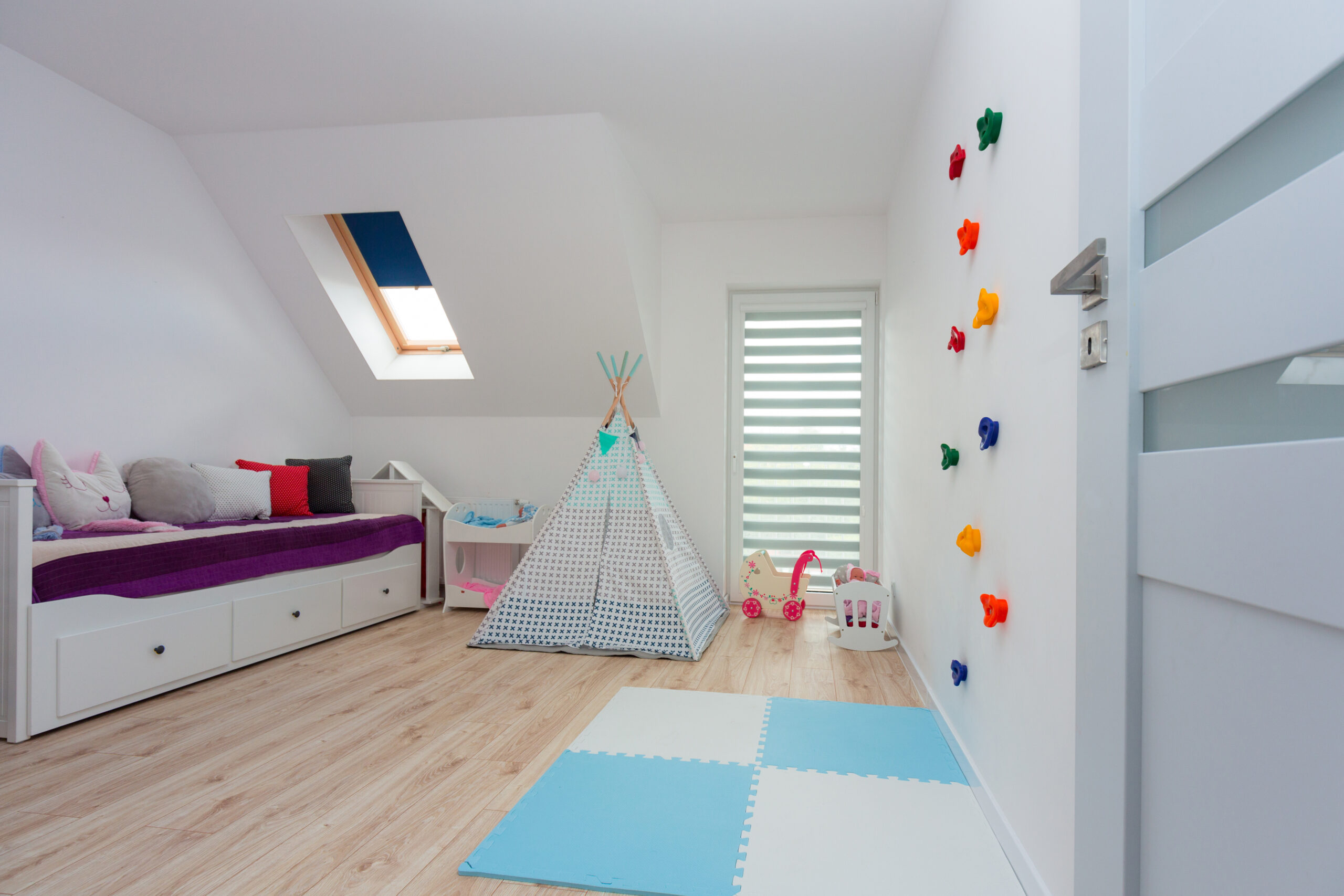 playroom with a climbing wall