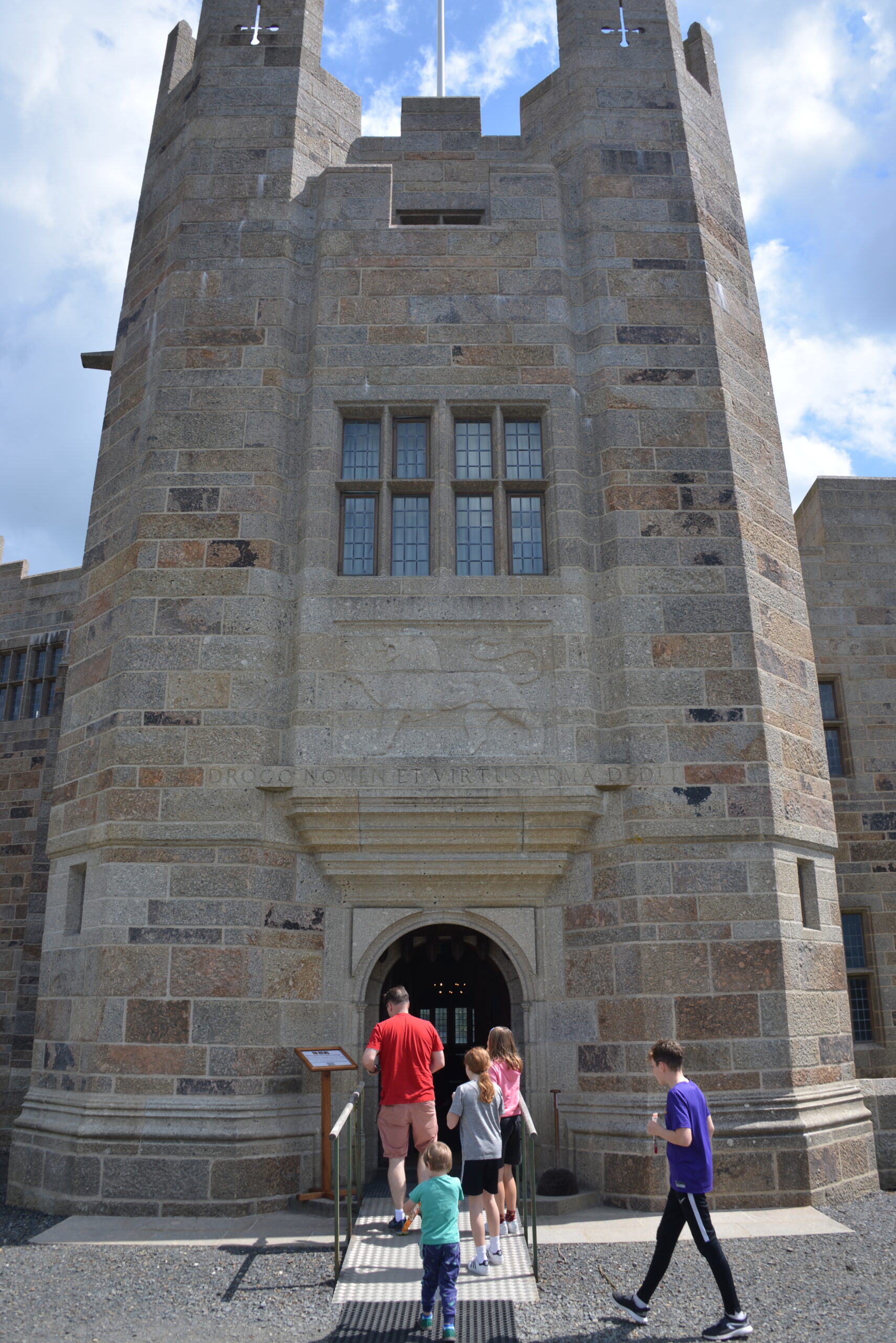 family entering Castle Drogo