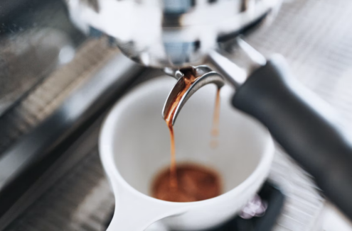 coffee pouring from a machine