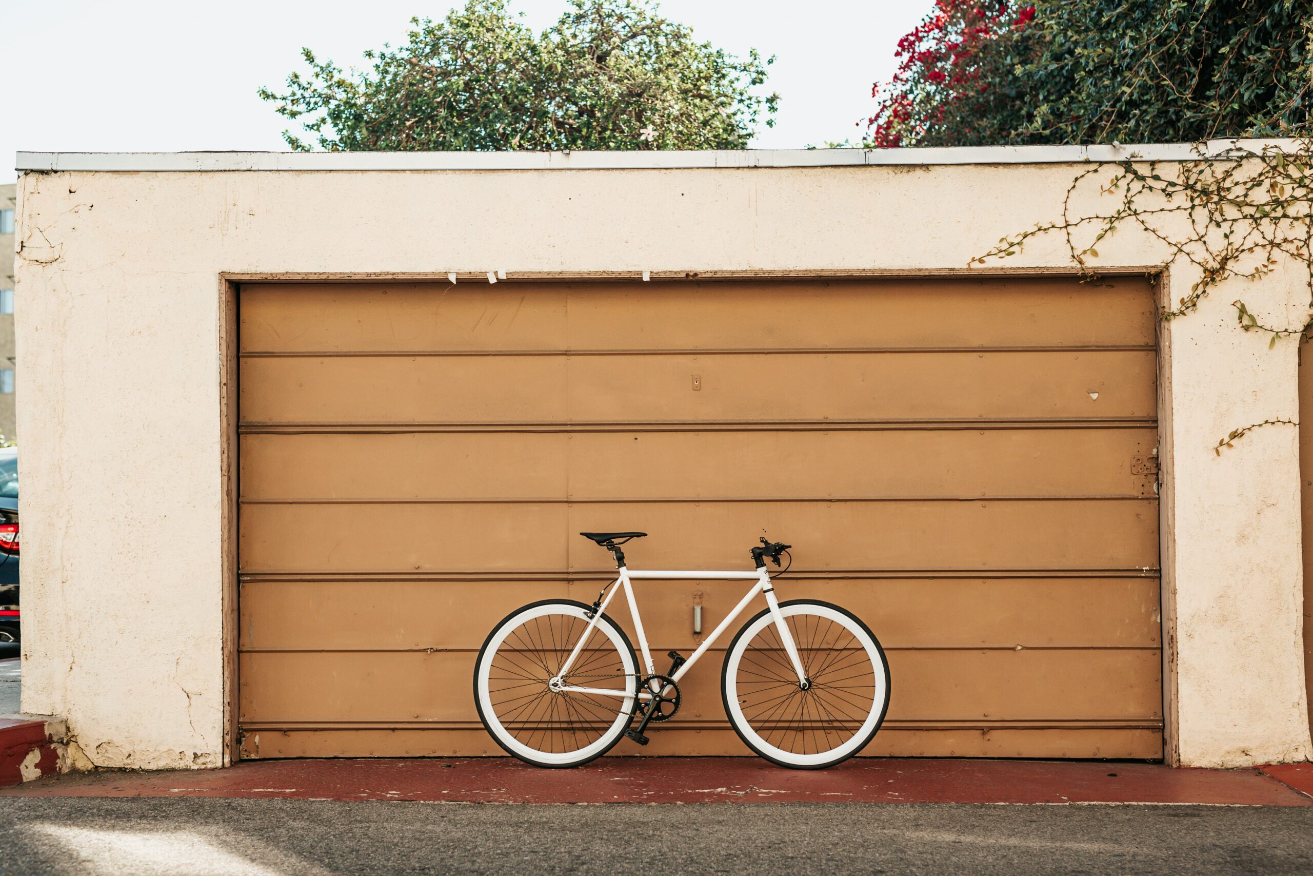 bike outside a garage with a flat roof