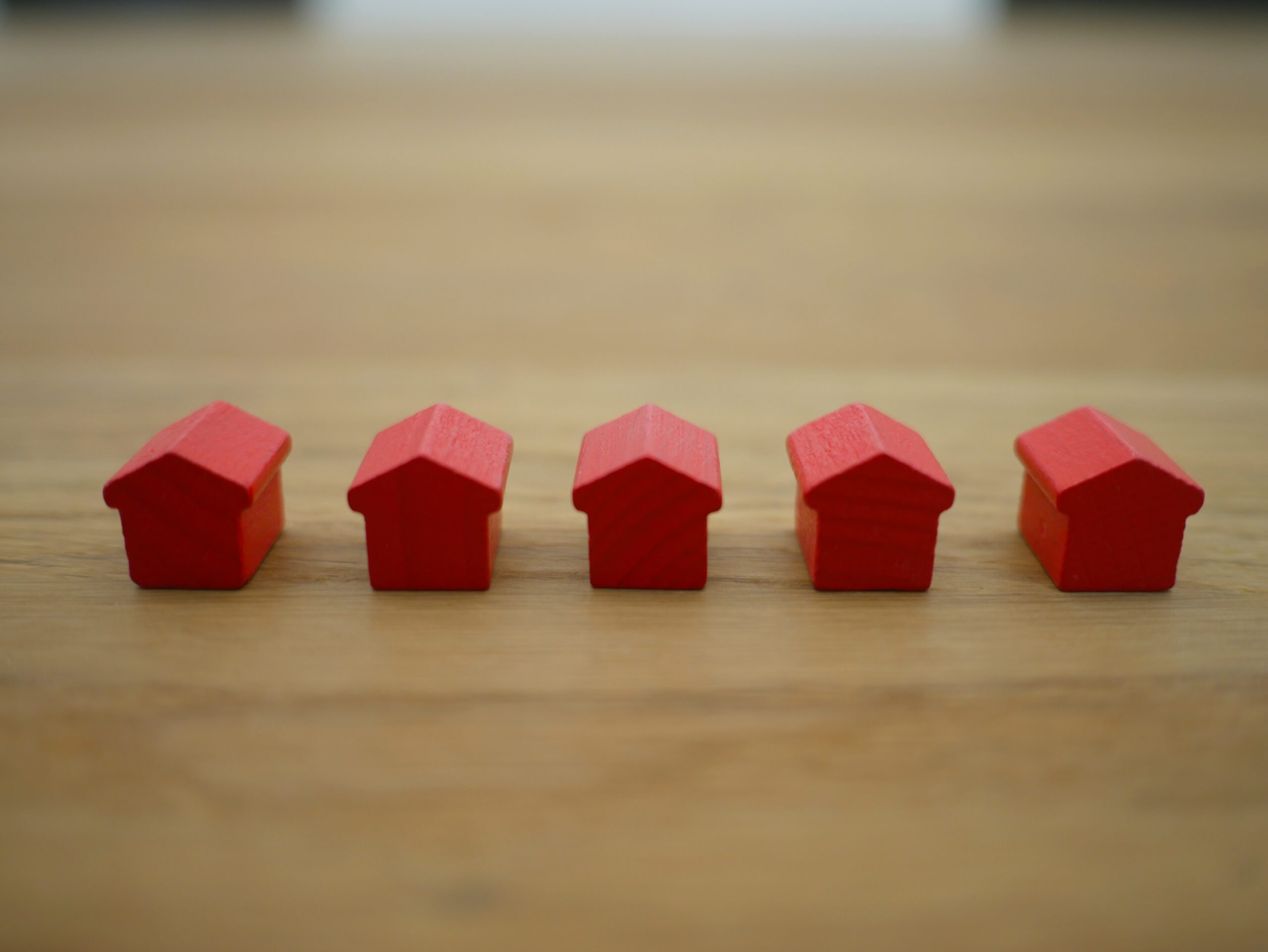 Image of 5 red wooden houses
