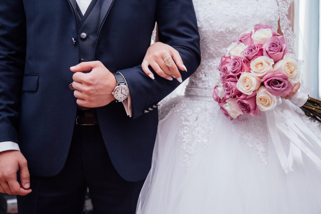 Bride and groom in a wedding suit and dress