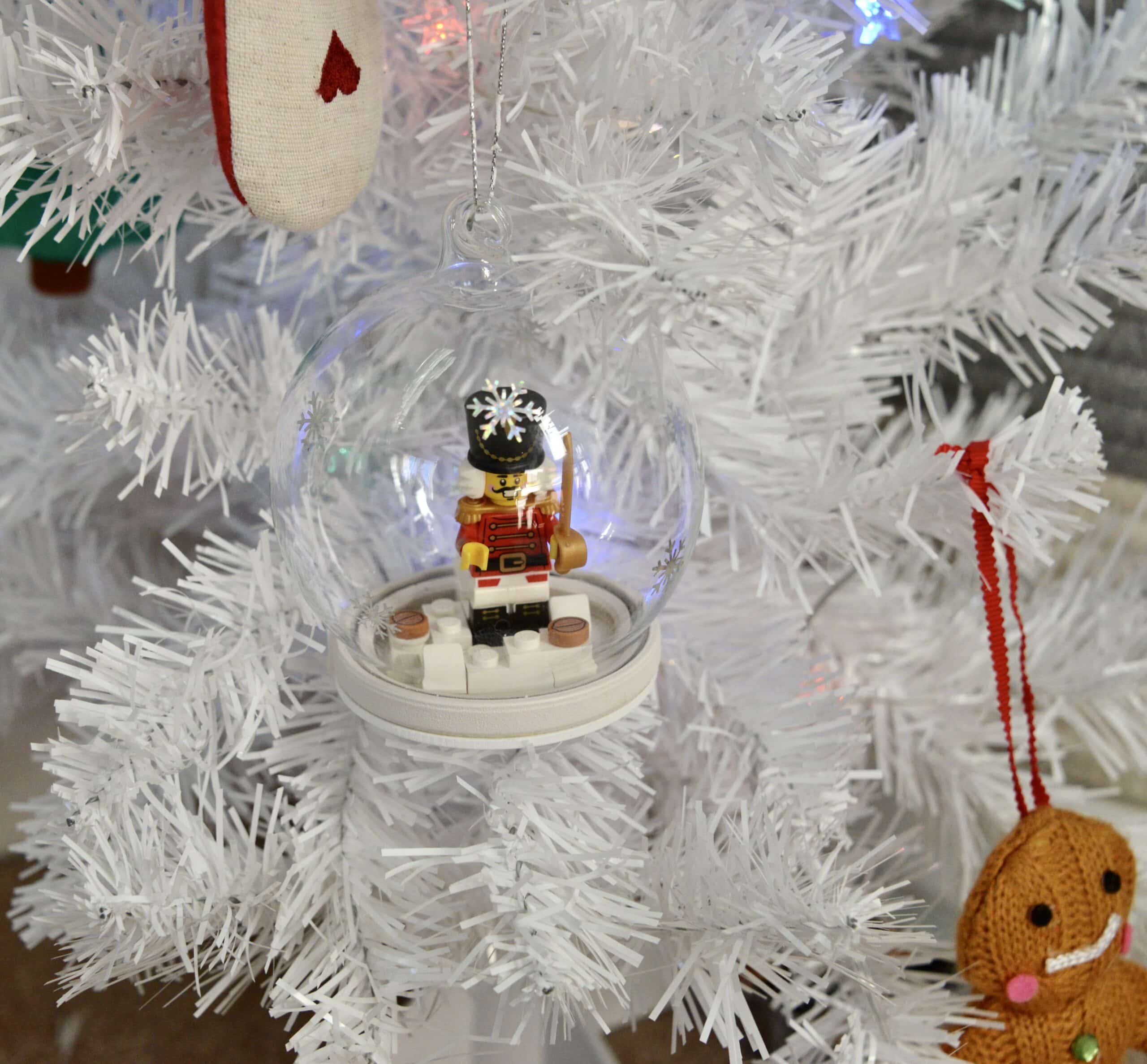 DIY LEGO snow globe tree decoration with a nutcracker figure inside