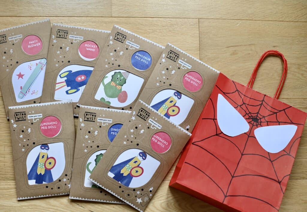 eco friendly party bag ideas. Mini craft kits and a Spiderman paper bag