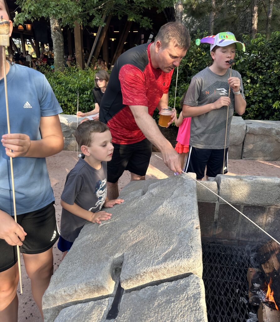 Toasting marshmallows at Wilderness Lodge