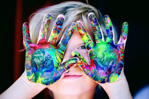 child with messy hands