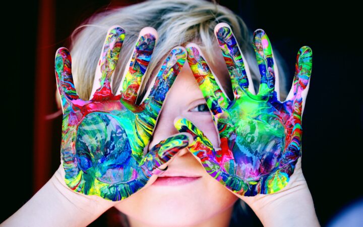 child with messy hands