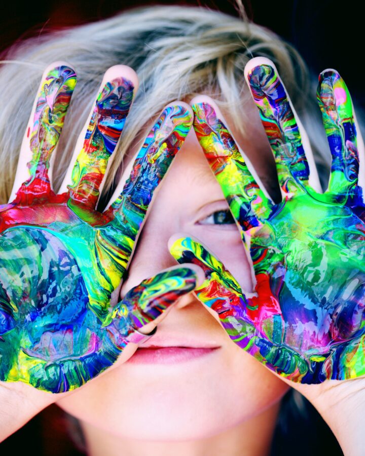 child with messy hands